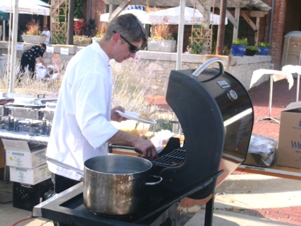 Preparing food for the Oktoberfest event recently was David Bandelier. (Photo by William Crum)