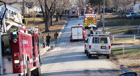 A resident was in critical condition after being pulled from a home on fire near South 51st and Argentine Boulevard on Tuesday morning. The resident died later in the day at the hospital. (Staff photo)