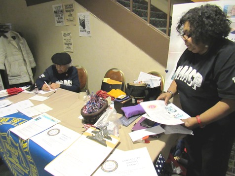 The NAACP table featured voter registration materials today at the King Day celebration at the Reardon Center, Kansas City, Kan. (Staff photo)