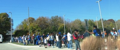 When the Royals won the World Series in 2015, long lines of people waited at Indian Springs Shopping Center to board a bus to take them to the victory rally at Union Station. (File photo)