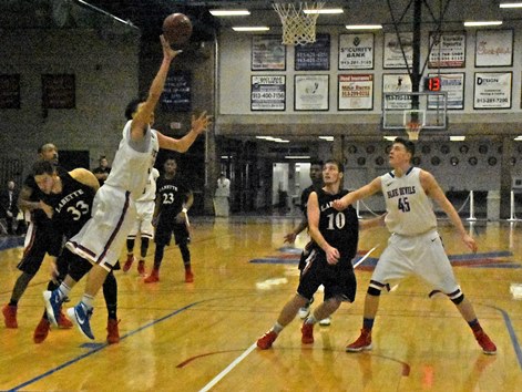 KCKCC’s Joe Lendway, putting up a shot at left, and Jonathan Murray (45), each had double doubles in the Blue Devils’ 86-56 win over Labette Wednesday. Lendway had 24 points and 14 rebounds; Murray 20 points and 16 rebounds. (KCKCC photo by Alan Hoskins) 