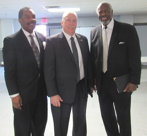 Chatting before a community meeting on foster care today at the Greater Pentecostal Temple were, left to right, Associate Pastor Tommy Hughes, Kansas House Democratic Leader Tom Burroughs and Bishop Marvin Donaldson. (Staff photo)