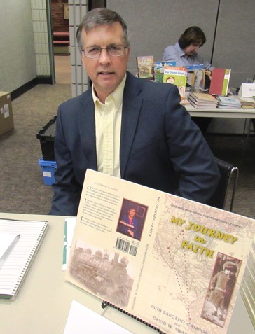 David Swafford co-wrote the book, "My Journey in Faith," with Ruth Saucedo Campos. Campos grew up in the Argentine area of Kansas City, Kan. Swafford was at the Homegrown Reads program Saturday at the West Wyandotte Library. (Photo by Mary Rupert)