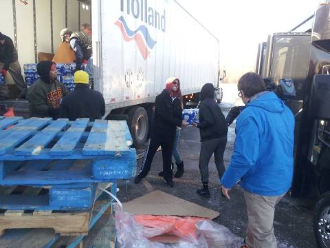 A Kansas City, Kan., resident recently led an effort to ship bottled water and deliver into the hands of Flint, Mich., residents. (Photo from Janice Witt)