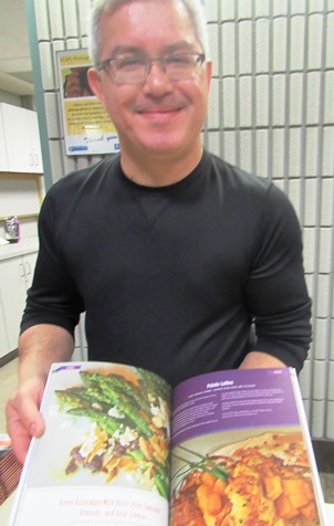 Pete Dulin displayed some recipes from Kansas City chefs in his book, “Last Bite: 100 Simple Recipes from Kansas City’s Best Chefs and Cooks." He was at the Homegrown Reads program Saturday at the West Wyandotte Library. (Photo by Mary Rupert)