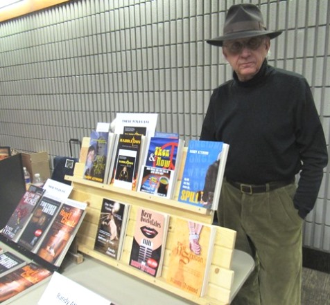 Randy Attwood had eight novels on display Saturday at the Homegrown Reads program at the West Wyandotte Library, Kansas City, Kan. (Photo by Mary Rupert)