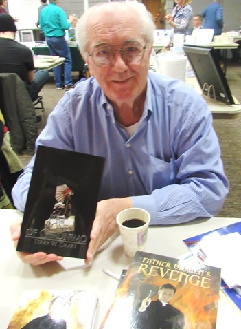 Terry W. Drake held his latest book, "The Bones of Geronimo," on Saturday at the Homegrown Reads program at the West Wyandotte Library. (Photo by Mary Rupert)