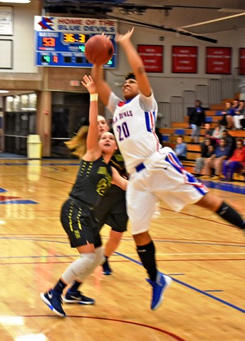 Cheyenne North’s 15th rebound with 36.3 seconds left was one of the biggest in KCKCC’s come-from-behind 54-50 win over Highland Tuesday. Fouled on the play, North made one of two free throws to give KCKCC a two-possession lead. (KCKCC photo by Alan Hoskins)