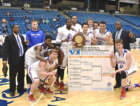 A jubilant group of KCKCC Blue Devils proudly showed off the 2016 Region VI championship plaque and the board that showed their route to the college’s first berth in the NJCAA Division II national tournament following a 77-66 win over Brown Mackie. (KCKCC photo by Alan Hoskins)