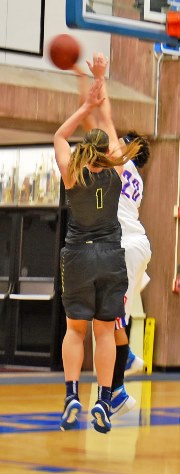 One of Cheyenne North’s three blocked shots came against Highland All-American candidate Szonia Vukov in KCKCC’s 54-50 win Tuesday. North finished with 25 points and 15 rebounds while Vukov was limited to eight points on 3-of-18 shots. (KCKCC photo by Alan Hoskins)