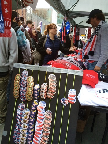 "Cash or card?" was the question about Trump items being sold near the rally. (Photo by Rebecca Tombaugh)