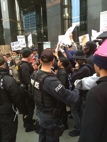 Kansas City, Mo., police moved in on protesters Saturday during a Trump rally in Kansas City, Mo. (Photo by Rebecca Tombaugh)