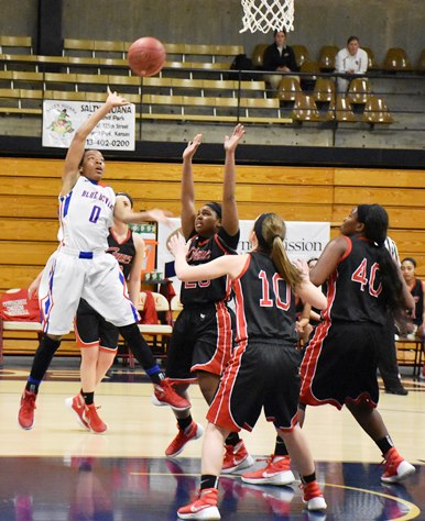 Sophomore guard Erin Anderson went in for a layup against Waubonsee in the Division II National Tournament. (KCKCC photo by Jason Browar)