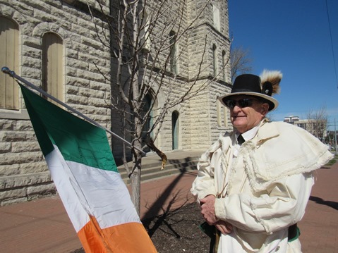 Mike Calwell, a Lewis and Clark re-enactor with the Friends of the Kaw, waited for the St. Patrick's Day walk to begin today in Kansas City, Kan. (Staff photo)