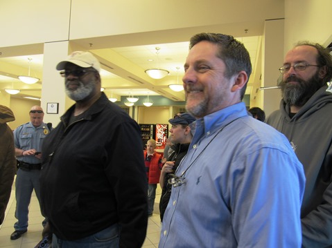 Mayor Mark Holland stood in line at the 4th District Democratic caucus Saturday at KCKCC-TEC, 65th and State Avenue, Kansas City, Kan. (Staff photo)