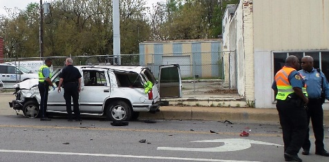 This was the crash scene near 51st and Leavenworth Road after bank robbery suspects were chased through Kansas City, Kan. on Saturday, April 16. (Photo by Lou Braswell)