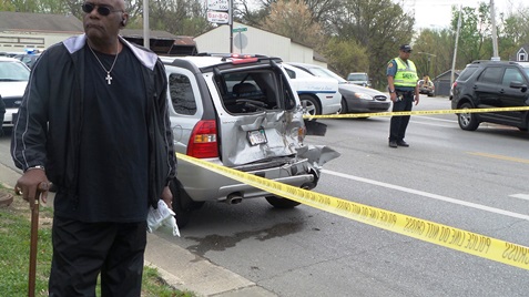 This was a crash scene near 51st and Leavenworth Road after bank robbery suspects were chased through Kansas City, Kan. (Photo by Lou Braswell)