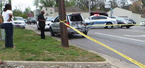 This was a crash scene near 51st and Leavenworth Road after bank robbery suspects were chased through Kansas City, Kan. (Photo by Lou Braswell)