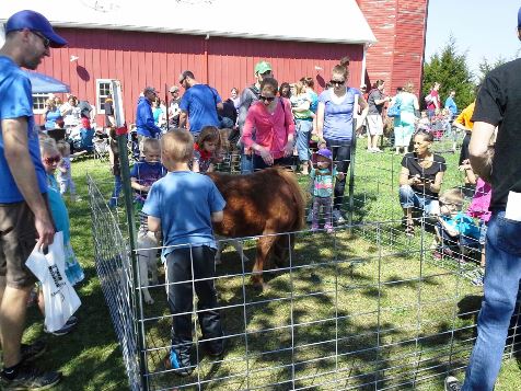 Barnyard Babies continues at the National Agricultural Center and Hall of Fame, 126th and State, Bonner Springs, through 3 p.m. on Saturday, April 23. This event kicks off the year for the Ag Hall. Children enjoyed meeting calves, piglets, chicks, kids and more baby animals. There were also train rides and hands-on activities for children. There is an admission charge. For more information, visit www.aghalloffame.com. (Photo by Steve Rupert)