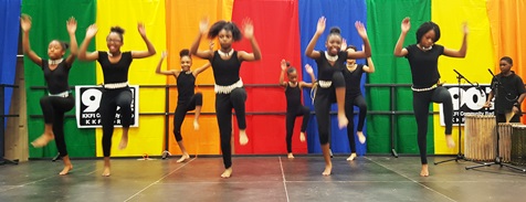 Danny Hinds and Ayotunde, a Caribbean drumming and dance group, performed April 16 at the Wyandotte County Ethnic Festival at Kansas City Kansas Community College. (Photo by William Crum)