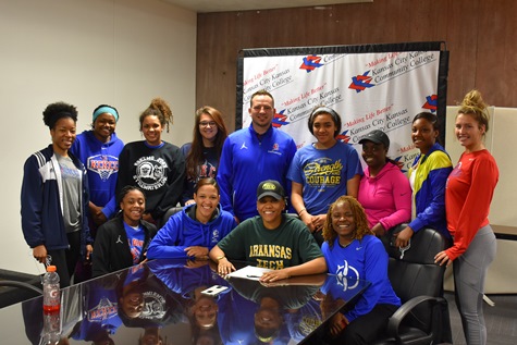 Teammates and coaches were on hand last week to see Kansas City Kansas Community College All-American Cheyenne North signing a letter of intent to attend Arkansas Tech University in Russellville. (KCKCC photo by Jason Browar)  