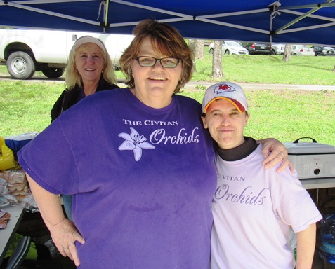 Volunteers from the Civitan Orchids staffed a refreshment stand on Saturday at the Sunflower Showdown at Wyandotte County Lake Park. Volunteers included Diana Jones, left, and Kamela Reynolds, right. (Staff photo by Mary Rupert)