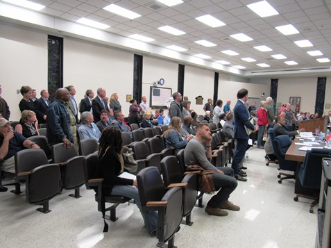 Those who were against the special use permit for The Woodlands were asked to stand at the Planning Commission meeting Monday night. (Staff photo by Mary Rupert)