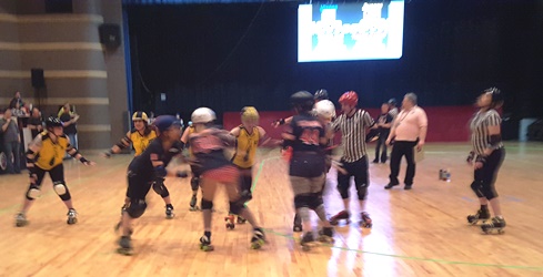 Roller derby action Saturday night at Kansas City, Kan., Memorial Hall. (Photo by William Crum)