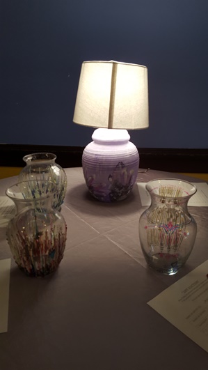 A benefit art auction for Alcott Arts Center, 180 S. 18th, Kansas City, Kan., was held Saturday evening. Vases and lamps made by art honors students at Blue Valley Northwest High School were auctioned off to benefit the Alcott Arts Center. (Photo by William Crum)