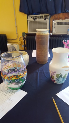 A benefit art auction for Alcott Arts Center, 180 S. 18th, Kansas City, Kan., was held Saturday evening. Vases and lamps made by art honors students at Blue Valley Northwest High School were auctioned off to benefit the Alcott Arts Center. (Photo by William Crum)