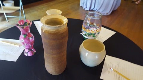 A benefit art auction for Alcott Arts Center, 180 S. 18th, Kansas City, Kan., was held Saturday evening. Vases and lamps made by art honors students at Blue Valley Northwest High School were auctioned off to benefit the Alcott Arts Center. (Photo by William Crum)