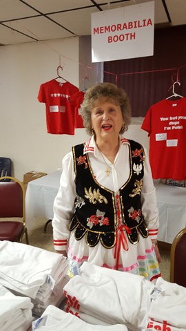 Agnes Franiuk with a concessions booth at Polski Day. After the Polski Day parade Saturday morning, a festival began at All Saints Church at 8th and Vermont, Kansas City, Kan. The benefit continued until 7 p.m. Saturday. At the festival, there was  polka dancing and Polish food. For more details, see https://wyandotteonline.com/preparations-underway-for-32nd-annual-polski-day-may-7-in-kck/. (Photo by William Crum)