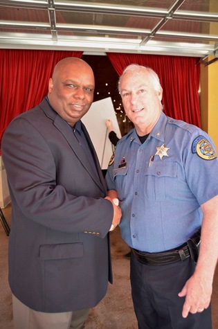 Current UWWC volunteer campaign chair, Bill Johnson of the Board of Public Utilities, and new volunteer campaign chair Sheriff Don Ash at the United Way of Wyandotte County’s annual campaign celebration event. (Photo from United Way of Wyandotte County)