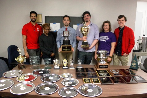 The KCKCC debate team displays the many awards, including national awards, it has won this year. (Photo from KCKCC)