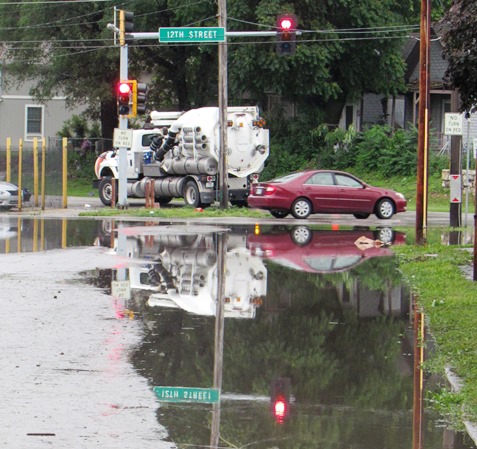 Parts of 12th and Miami (Argentine Boulevard) were flooded on Friday evening, May 27. Wyandotte County is currently under a Flood warning until 10 p.m. tonight and a flash flood watch until 7 a.m. Saturday. (Staff photo)