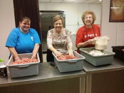 Working in the kitchen recently to prepare golambki (cabbage rolls) for Polski day were, left to right, Becky Hartman, Donna Strick and Betty Kolenda. (Photo by Kathy Hanis) 