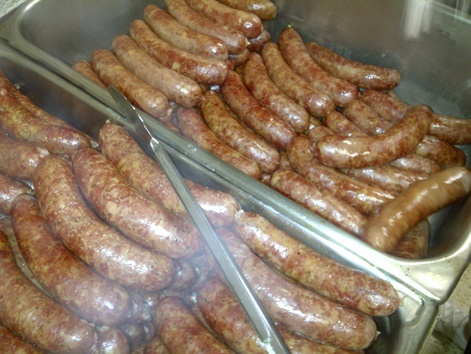 Three hundred seventy-five pounds of Polish sausage, or kielbasa, are being prepared for Polski Day on Saturday, May 7. (Photo by Kathy Hanis) 