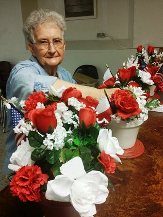 Ethel Golubski prepared table decorations for the 32nd Annual Polski Day Celebration set for Saturday, May 7. (Photo by Kathy Hanis). 