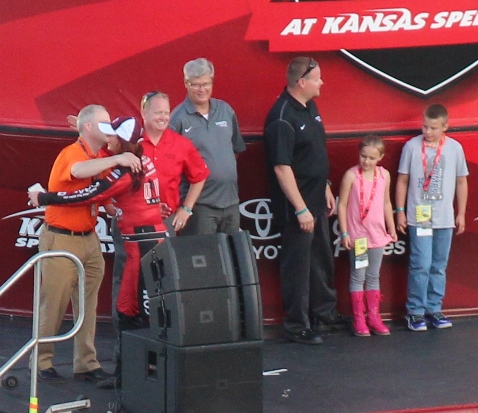 Jennifer Jo Cobb, a race car driver from Kansas City, Kan., in pre-race activities Friday night at Kansas Speedway. (Fan photo)