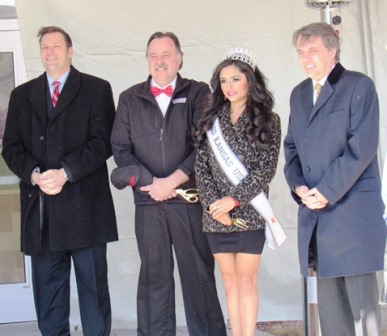 Dignitaries including the lieutenant governor, Dr. Jeff Colyer, right, welcomed a new Krispy Kreme doughnut shop to Wyandotte Plaza, 78th and State, in Kansas City, Kan., in February 2015. (File photo by Mary Rupert)