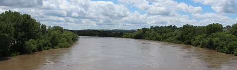 A view of the Kaw River from the James Street Bridge. The Kaw was in minor flood stage on Saturday. 