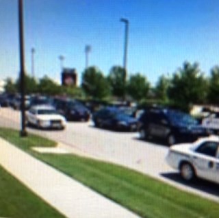 A large procession of motorcycles and law enforcement vehicles traveled from the funeral of Detective Brad Lancaster at Children's Mercy Park to a cemetery in Weston, Mo., today. (Photo by a community member)