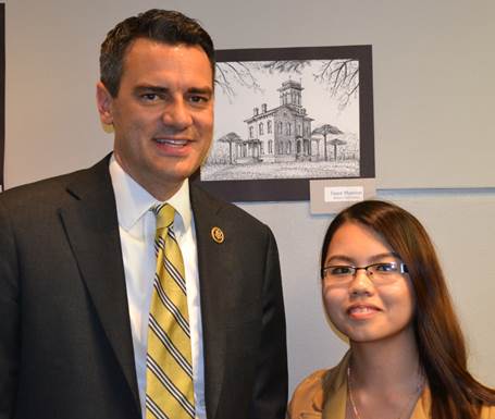 Rep. Yoder with Third District winner Padee Vang and her drawing titled “Sauer Mansion.” (Submitted photo)