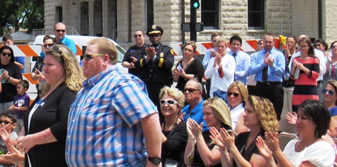 Deputy Scott Wood, who was shot last year while in uniform at a convenience store in Kansas City, Kan., attended the ceremony today. (Staff photo)