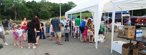 Kids and their parents were in line at 7 a.m. to register at the Leavenworth Road Association Kids’ Fishing Derby today at Wyandotte County Lake. (Photo from Leavenworth Road Association)