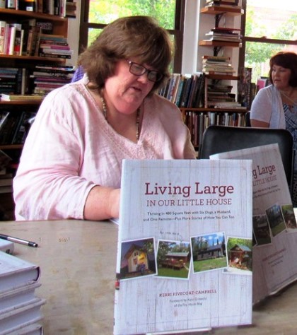 Kerri Fivecoat-Campbell signed autographs of her new book, “Living Large in Our Little House,” at a recent book launch event. (Staff photo)