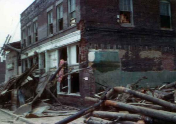 Aftermath - This building in the Armourdale community of Kansas City, Kan., at the east end of Kansas Avenue was severely damaged during the 1951 flood. It housed a restaurant and tavern that nearby meatpacking company employees frequented. The Clarke Investment  Company owned the building. (Photo courtesy of Joe H. Vaughan Jr.)  