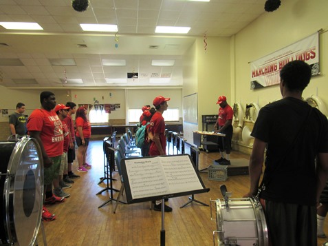 Wyandotte students stand at attention at the end of band practice last Wednesday. (Staff photo by Mary Rupert)