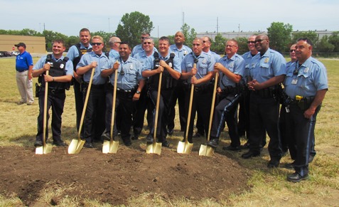 Kansas City, Kan., police officers posed today for a photo at the groundbreaking for the new South Patrol police station at 21st and Metropolitan Avenue. (Staff photo)