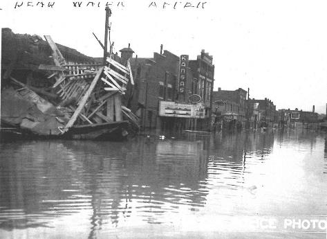 Theater - The Kansas movie theater in the Armourdale community of Kansas City, Kan., was damaged by the 1951 flood. This view shows Kansas Avenue near St. Paul Street. (Photo courtesy of the Wyandotte County Museum) 